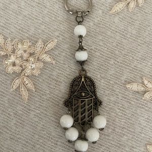 White beaded hamsa keychain